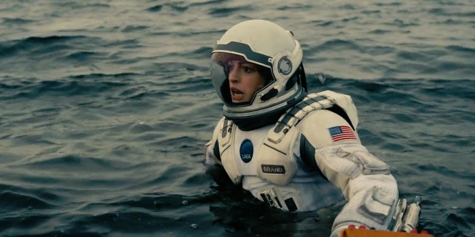 Anne Hathaway as Amelia Brand, risking life and limb for the mission. 
