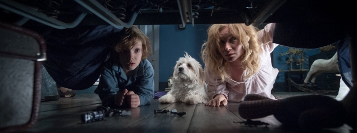 A terrified Samuel (Noah Wiseman) asks his mother, Amelia (Essie Davis), to check for the monster under the bed.